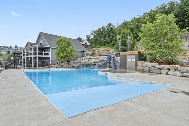 400 Lake Front Dr, Branson, MO 65616 - view of swimming pool with a water slide and a patio area