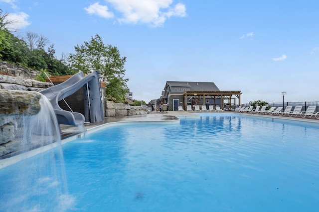 400 Lake Front Dr, Branson, MO 65616 - community pool featuring a pergola, a water slide, and a patio