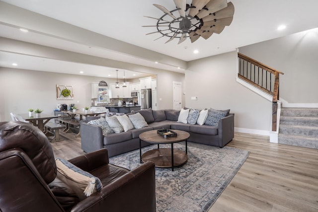 400 Lake Front Dr, Branson, MO 65616 - living area with light wood-type flooring, stairs, ceiling fan, recessed lighting, and baseboards