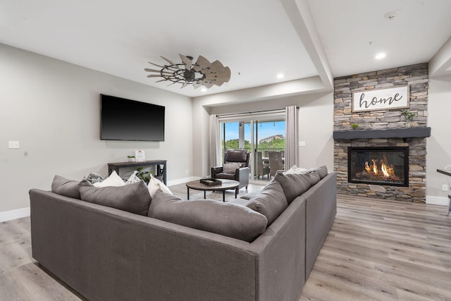 400 Lake Front Dr, Branson, MO 65616 - living area with baseboards, light wood-style flooring, a fireplace, and recessed lighting