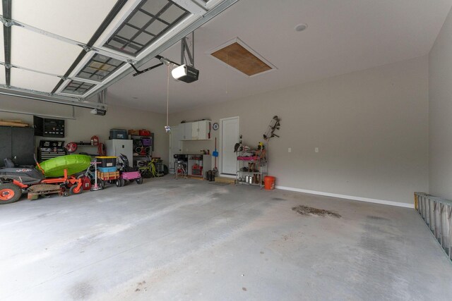 419 Wyldewood Dr, Fordland, MO 65652 - garage with a garage door opener