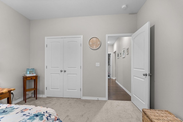 419 Wyldewood Dr, Fordland, MO 65652 - bedroom featuring carpet, a closet, and baseboards