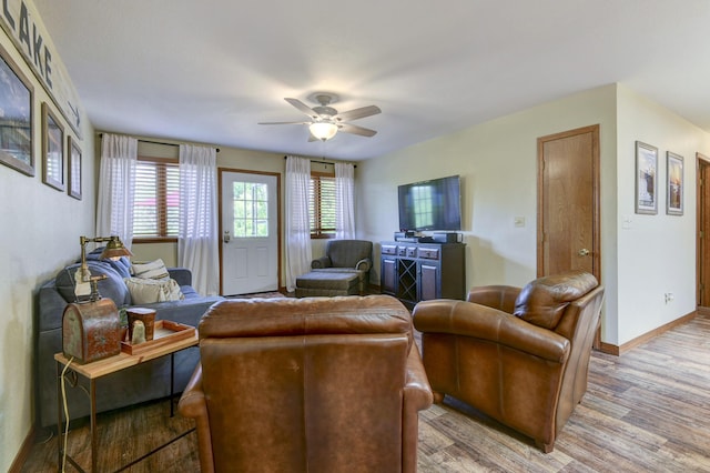 26094 State Highway 39, Shell Knob, MO 65747 - living room with light wood finished floors, ceiling fan, and baseboards