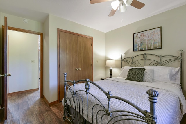 26094 State Highway 39, Shell Knob, MO 65747 - bedroom with dark wood-style flooring, a closet, baseboards, and ceiling fan