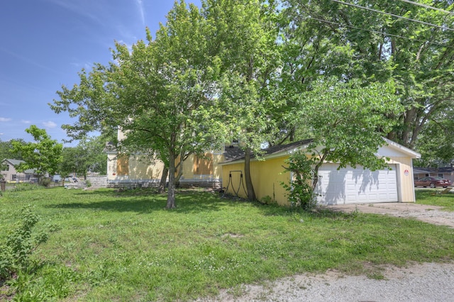 302 S Pennsylvania St, Webb City, MO 64870 - view of green lawn with a detached garage