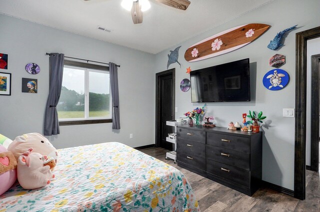 22510 Lawrence Unit 1200, Aurora, MO 65605 - bedroom featuring wood finished floors, baseboards, and ceiling fan