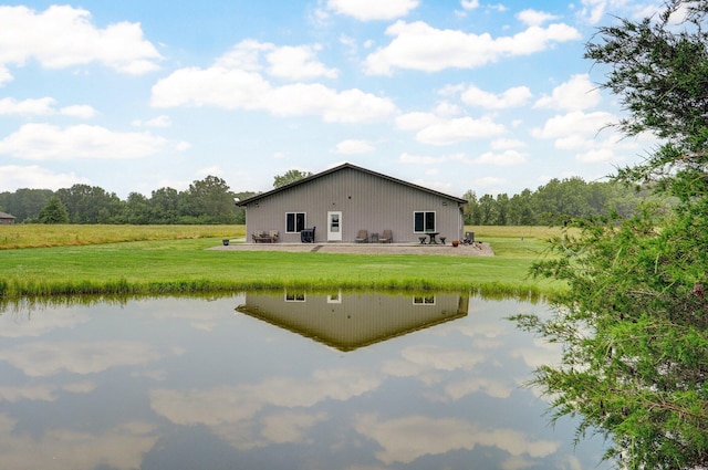 22510 Lawrence Unit 1200, Aurora, MO 65605 - back of house featuring a water view and a yard