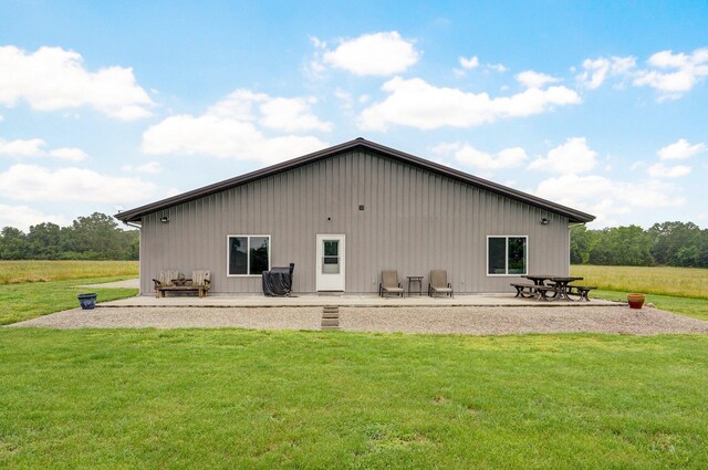 22510 Lawrence Unit 1200, Aurora, MO 65605 - rear view of house with a patio area and a yard