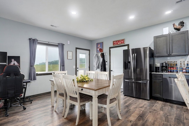 22510 Lawrence Unit 1200, Aurora, MO 65605 - dining room featuring dark wood-type flooring, recessed lighting, and a bar