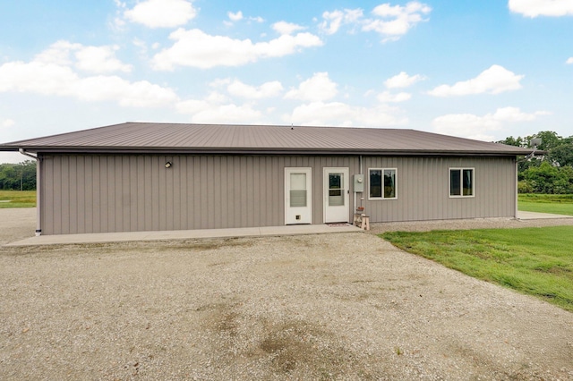 22510 Lawrence Unit 1200, Aurora, MO 65605 - rear view of house featuring a yard and metal roof