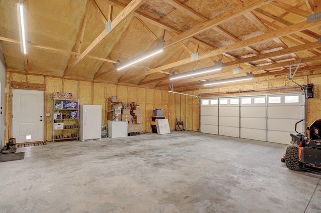 22510 Lawrence Unit 1200, Aurora, MO 65605 - garage with freestanding refrigerator