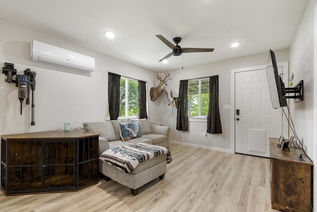 166 Seaman St, Cape Fair, MO 65624 - living room featuring a wall mounted air conditioner, ceiling fan, light wood-style floors, baseboards, and recessed lighting