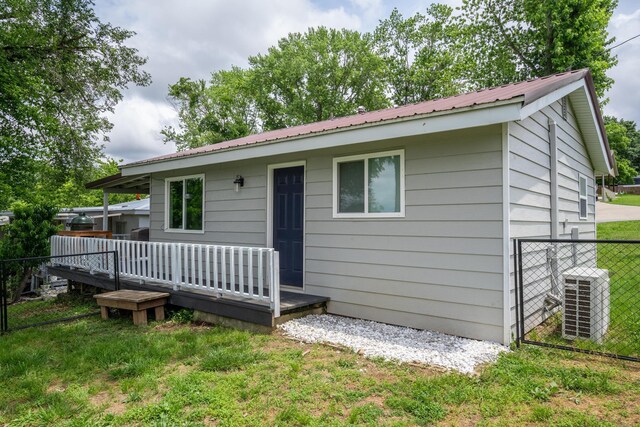 166 Seaman St, Cape Fair, MO 65624 - ranch-style house featuring a deck, metal roof, and central AC