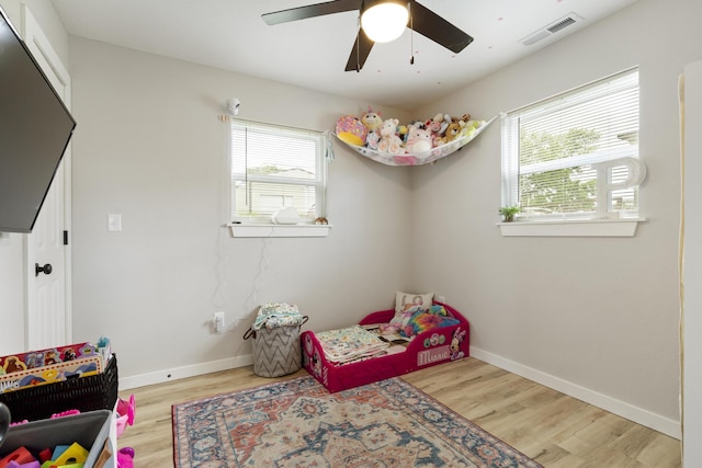 166 Seaman St, Cape Fair, MO 65624 - bedroom with light wood-style floors, baseboards, and a ceiling fan