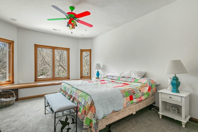 1915 S Farm Rd Unit 219, Springfield, MO 65809 - bedroom featuring carpet flooring, baseboards, and ceiling fan