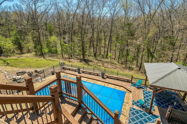1915 S Farm Rd Unit 219, Springfield, MO 65809 - wooden deck with a wooded view