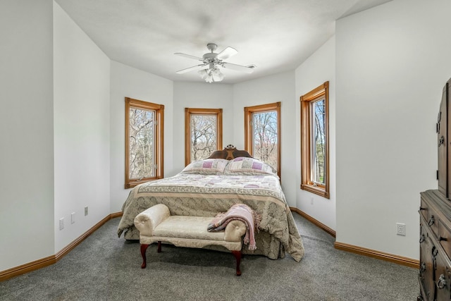 1915 S Farm Rd Unit 219, Springfield, MO 65809 - carpeted bedroom featuring baseboards and ceiling fan
