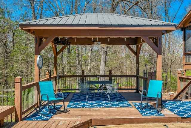 1915 S Farm Rd Unit 219, Springfield, MO 65809 - wooden terrace with a gazebo and outdoor dining space