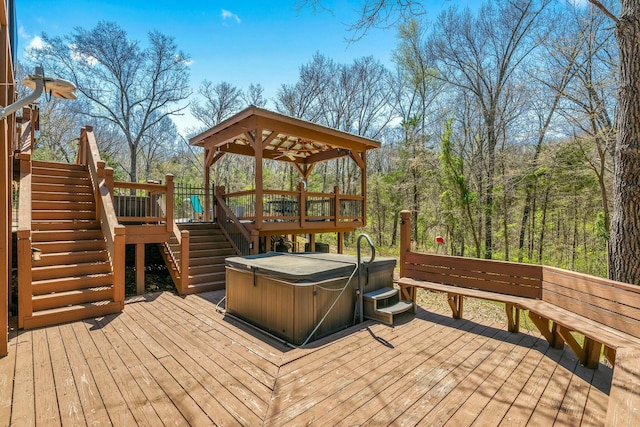 1915 S Farm Rd Unit 219, Springfield, MO 65809 - wooden deck featuring a hot tub and stairs