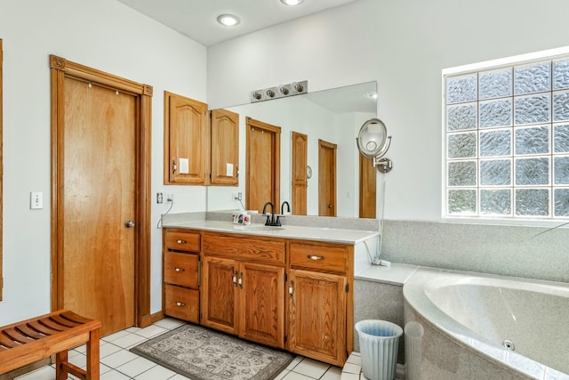 1915 S Farm Rd Unit 219, Springfield, MO 65809 - full bath with vanity, a bath, and tile patterned floors