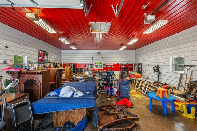 1915 S Farm Rd Unit 219, Springfield, MO 65809 - garage with a garage door opener