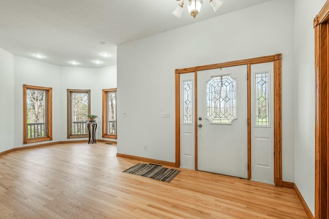 1915 S Farm Rd Unit 219, Springfield, MO 65809 - entryway with light wood-style flooring, baseboards, and recessed lighting