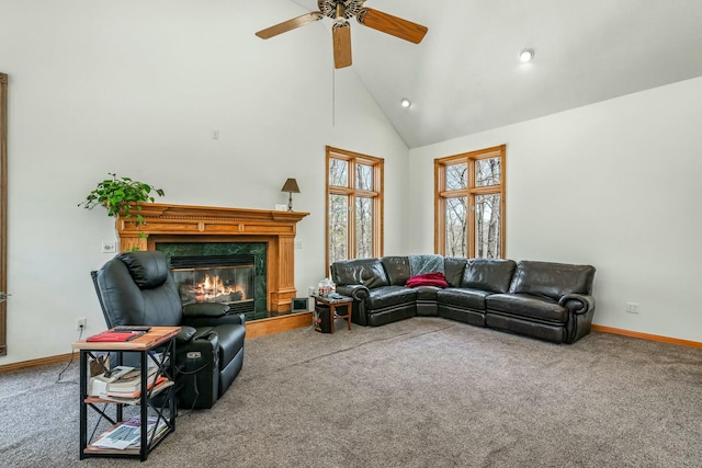 1915 S Farm Rd Unit 219, Springfield, MO 65809 - carpeted living area with high vaulted ceiling, a ceiling fan, a fireplace, baseboards, and recessed lighting
