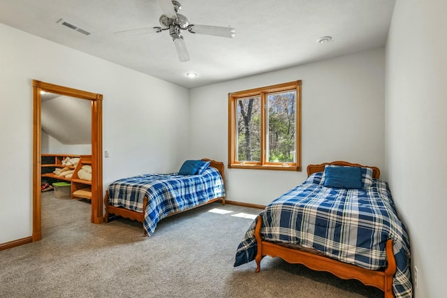1915 S Farm Rd Unit 219, Springfield, MO 65809 - carpeted bedroom featuring baseboards and a ceiling fan