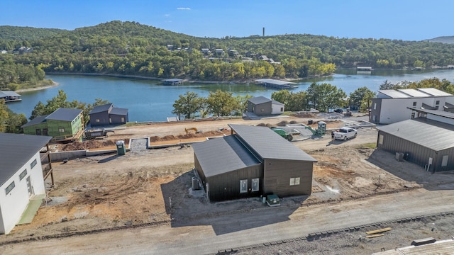 20 Teak Dr Unit 15, Reeds Spring, MO 65737 - bird's eye view of a forest and a nearby body of water