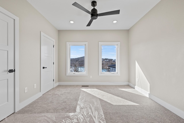 20 Teak Dr Unit 15, Reeds Spring, MO 65737 - unfurnished bedroom with carpet, baseboards, a ceiling fan, and recessed lighting