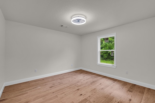 3002 Ginger Dr, West Plains, MO 65775 - unfurnished room with light wood-type flooring and baseboards