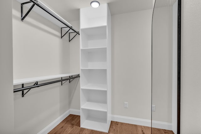 3002 Ginger Dr, West Plains, MO 65775 - walk in closet with wood finished floors