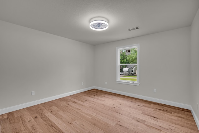 3002 Ginger Dr, West Plains, MO 65775 - spare room with baseboards and light wood-style flooring