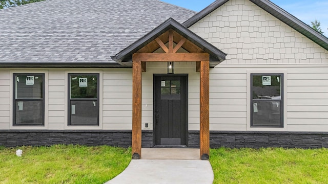 3002 Ginger Dr, West Plains, MO 65775 - doorway to property with roof with shingles and a lawn