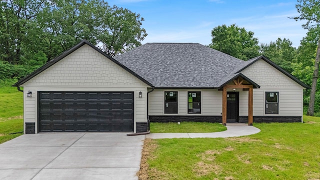 3002 Ginger Dr, West Plains, MO 65775 - modern farmhouse with an attached garage, driveway, a front yard, stone siding, and roof with shingles