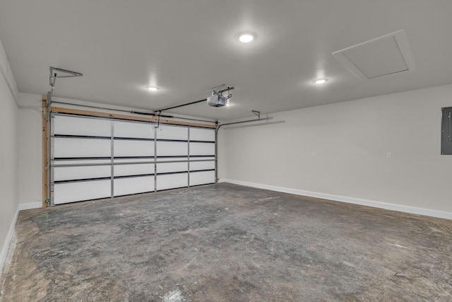 3002 Ginger Dr, West Plains, MO 65775 - garage featuring a garage door opener, baseboards, and electric panel