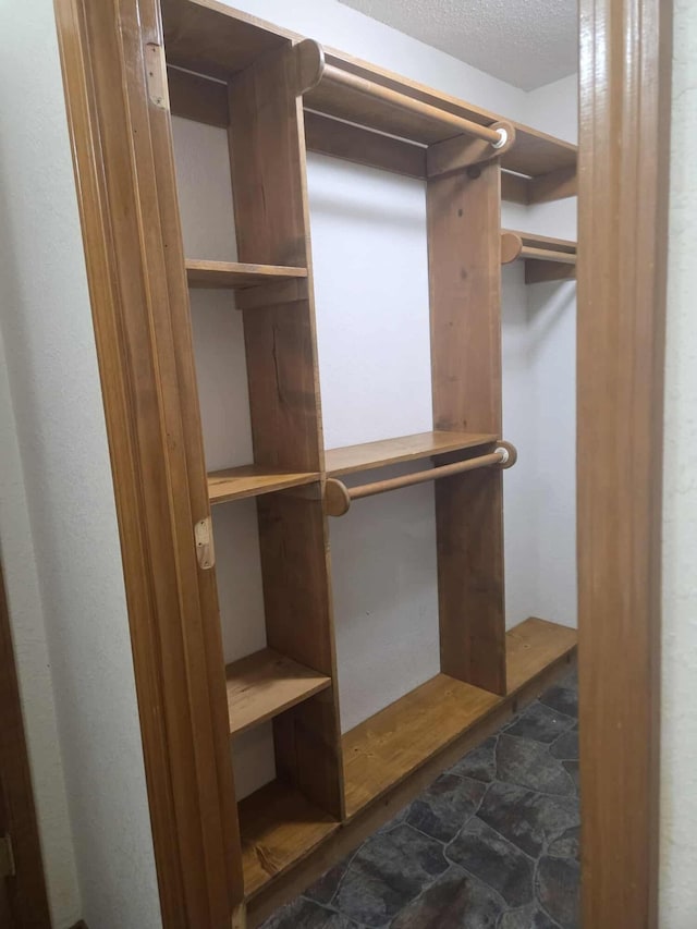 108 Prince St, Buffalo, MO 65622 - spacious closet featuring dark stone finish floors