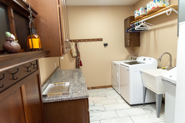 1762 Hickory Ridge Cir, Nixa, MO 65714 - washroom with light marble finish floors, washer and dryer, cabinet space, and baseboards