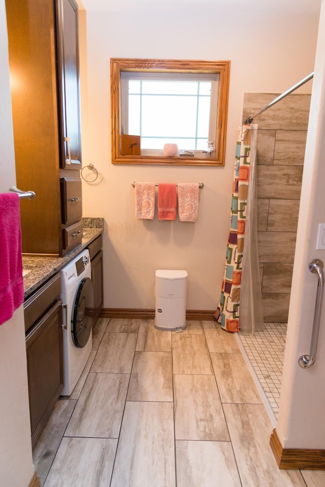 1762 Hickory Ridge Cir, Nixa, MO 65714 - laundry room with washer / clothes dryer and baseboards