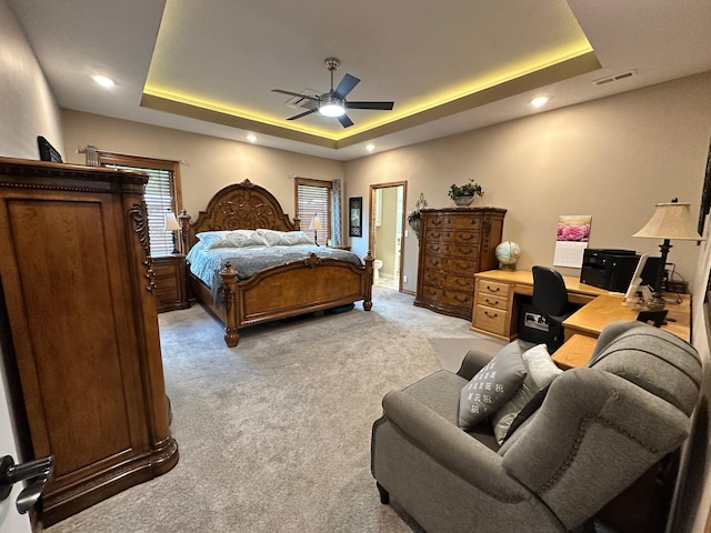 1762 Hickory Ridge Cir, Nixa, MO 65714 - bedroom with a raised ceiling, light colored carpet, an office area, recessed lighting, and a ceiling fan