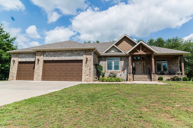 1762 Hickory Ridge Cir, Nixa, MO 65714 - view of front of property with a garage, a front yard, concrete driveway, a shingled roof, and brick siding