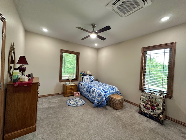 1762 Hickory Ridge Cir, Nixa, MO 65714 - bedroom featuring multiple windows, carpet, baseboards, recessed lighting, and ceiling fan