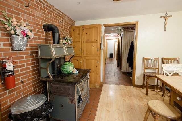 19429 E State Highway 14, Ava, MO 65608 - hall with brick wall and tile patterned floors