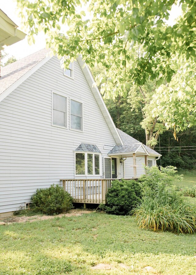 19429 E State Highway 14, Ava, MO 65608 - back of house featuring a yard, a deck, and roof with shingles