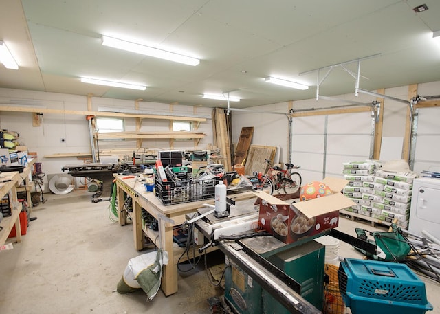 19429 E State Highway 14, Ava, MO 65608 - garage featuring a workshop area and washer / dryer