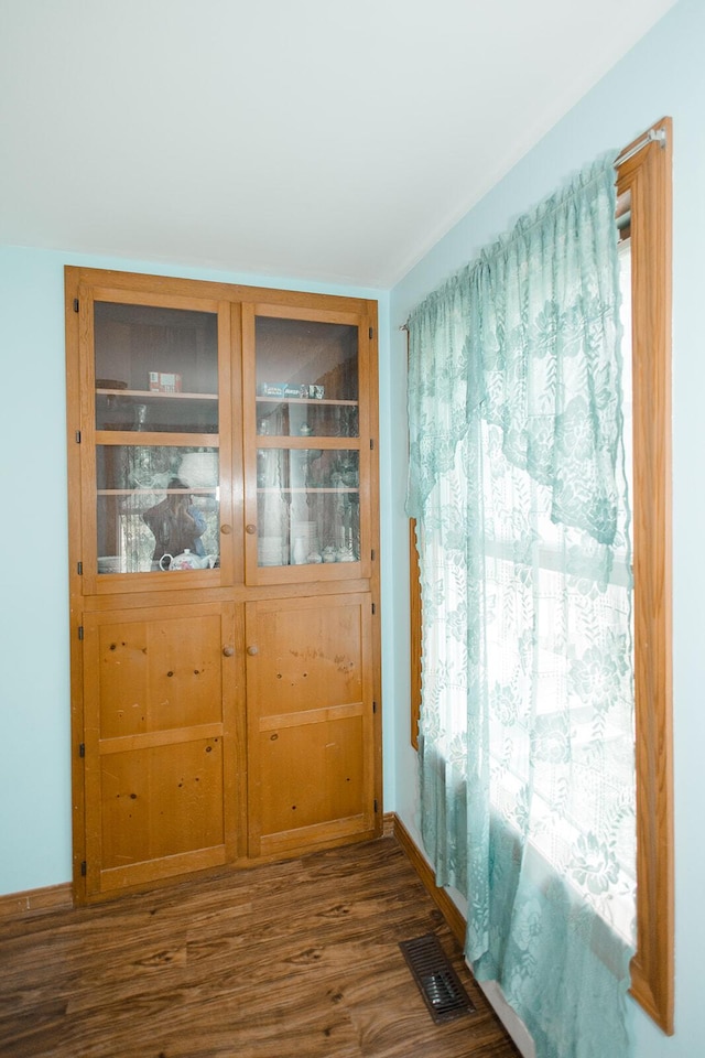 19429 E State Highway 14, Ava, MO 65608 - empty room featuring dark wood-style floors