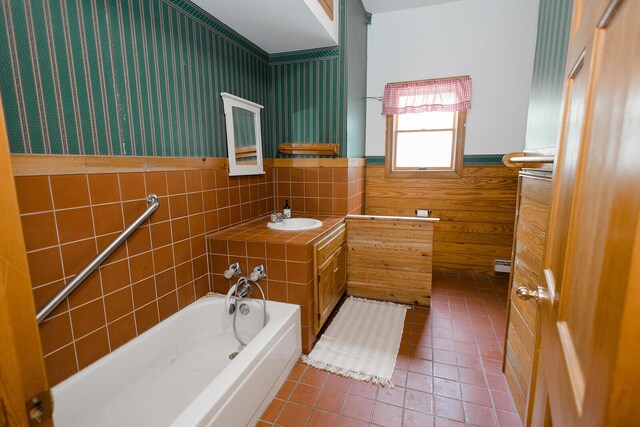 19429 E State Highway 14, Ava, MO 65608 - full bath featuring a wainscoted wall, tile patterned flooring, vanity, a tub, and baseboard heating