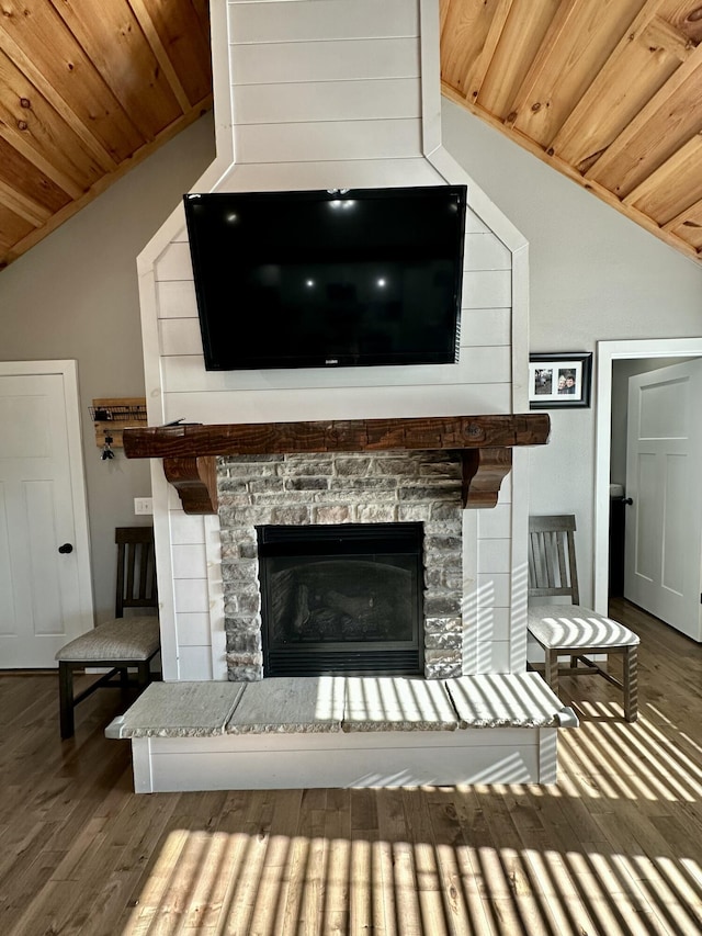 923 Riverview Rd, Marshfield, MO 65706 - detailed view of wood finished floors, a stone fireplace, and wooden ceiling