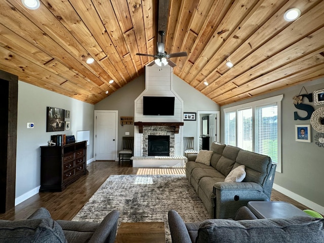 923 Riverview Rd, Marshfield, MO 65706 - living area featuring lofted ceiling, baseboards, wooden ceiling, a ceiling fan, and a stone fireplace