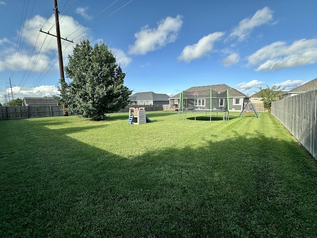 923 Riverview Rd, Marshfield, MO 65706 - view of yard featuring a trampoline and a playground